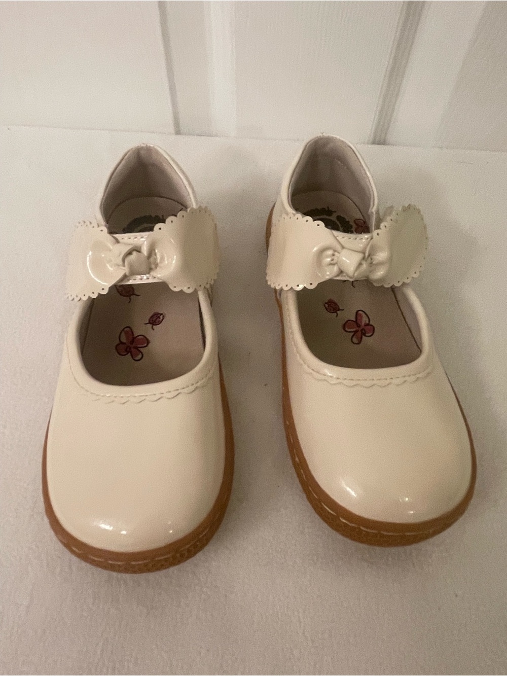 Livie & Luca Cream Patent Mary Jane Shoes with Bow Strap